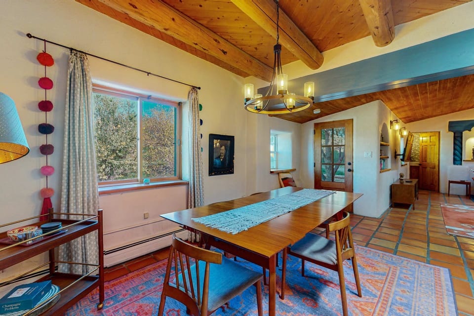 Dining for six beneath a striking chandelier