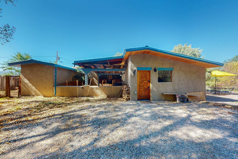 A character-filled adobe home on a lush .76-acre lot