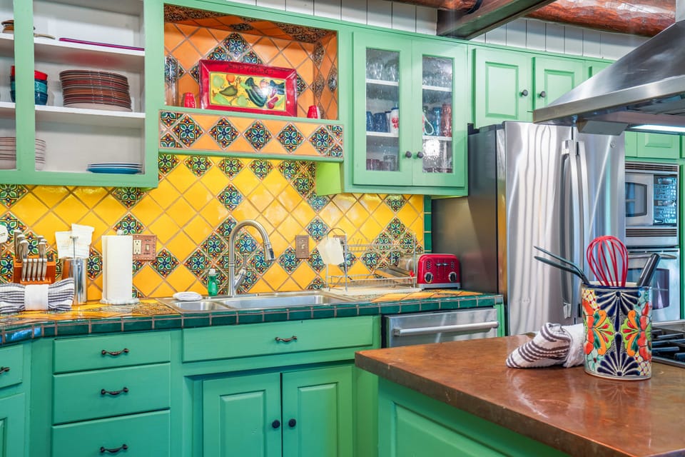 Enjoy the colorful Southwest charm of the open kitchen