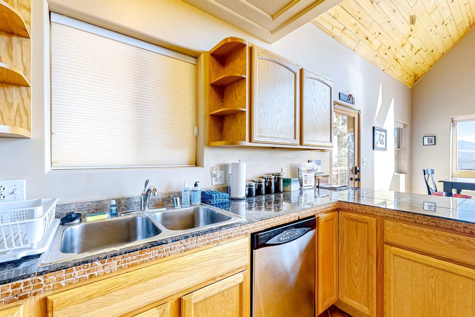 Clean up easily with a dishwasher and double sink
