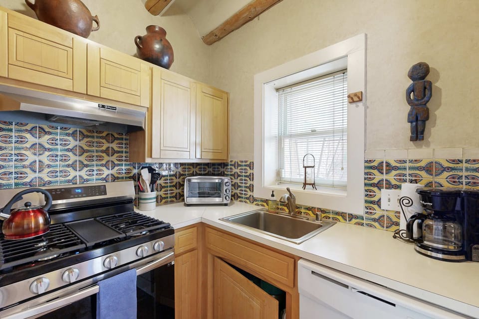 Well stocked with a dishwasher, coffee maker, and more