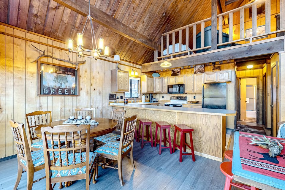 Pull up a stool at the breakfast bar in the open kitchen
