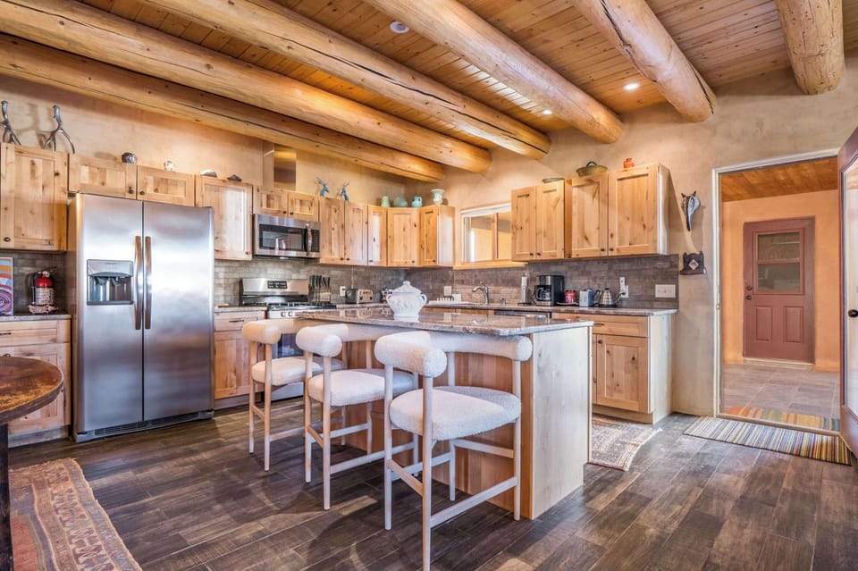 Gather around the granite island to cook and connect
