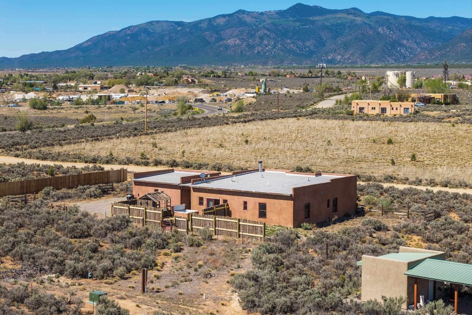 Enjoy a fully fenced yard backed by mountain views