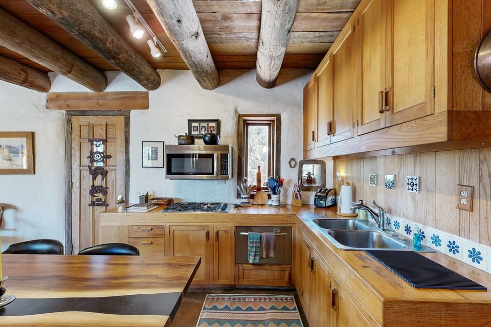 A full kitchen with a gas stove and everything you need