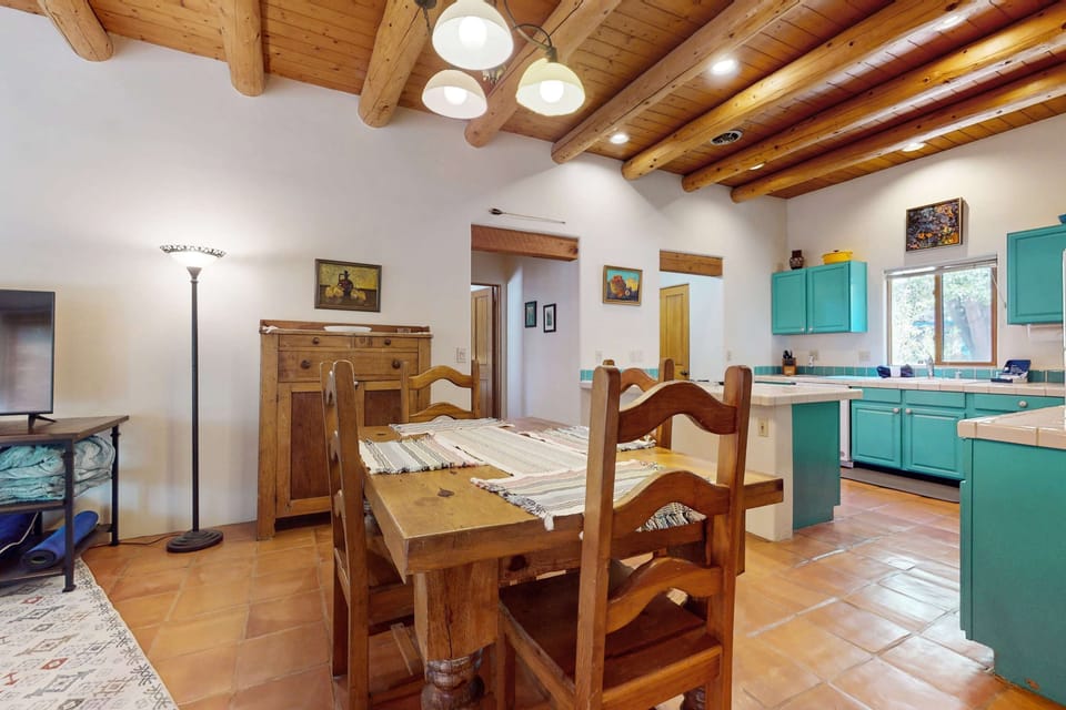 An open layout flows from dining to kitchen