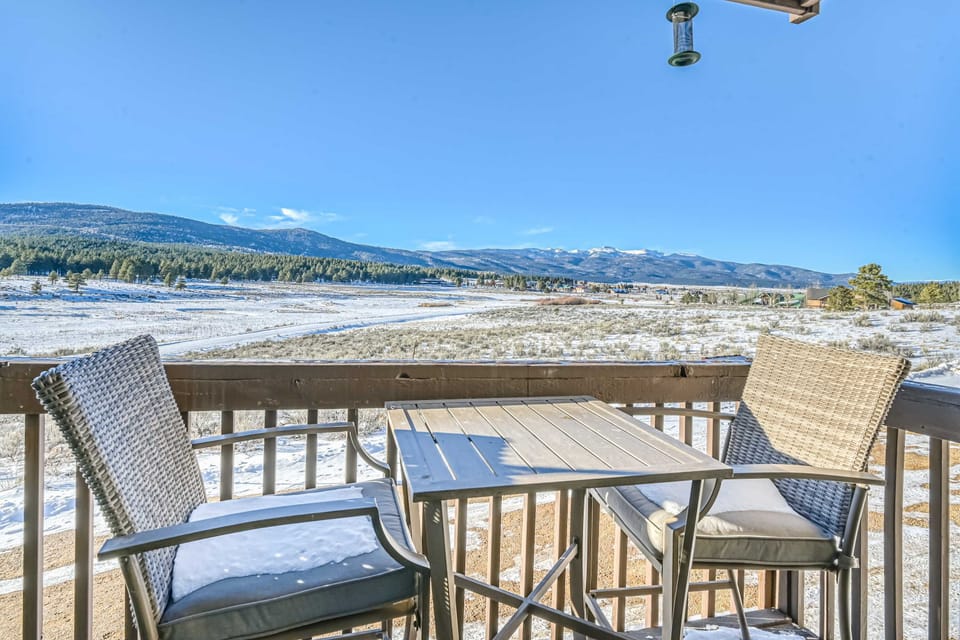 Take in ice-capped peaks and meadow views from the private balcony