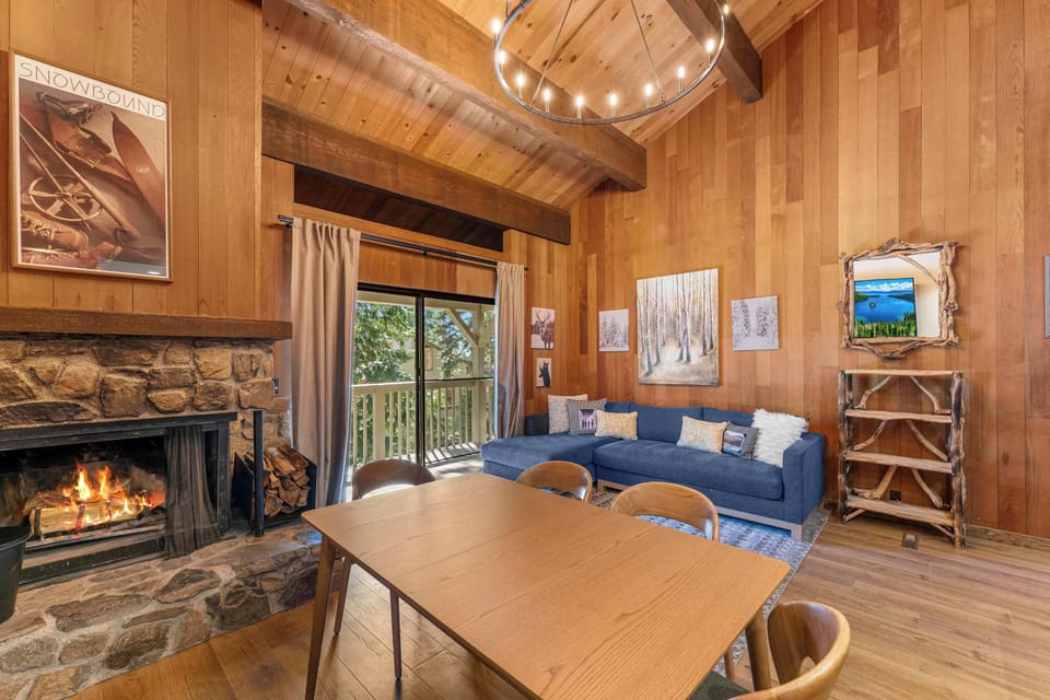 Gas & Wood burning fireplace, extendable dining table for 6-8 guests seated at table and bar top.  Upstairs deck with gorgeous courtyard views.