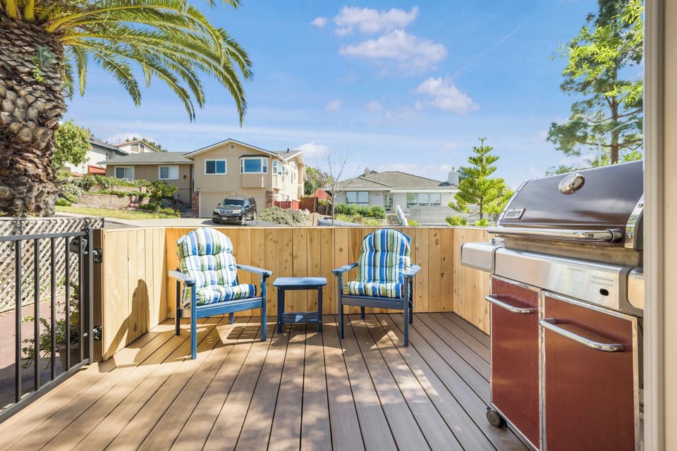 Soak in the beautiful SLO weather on the private deck (Not shown: A tilt-adjustable patio umbrella has been added for extra shade and privacy)