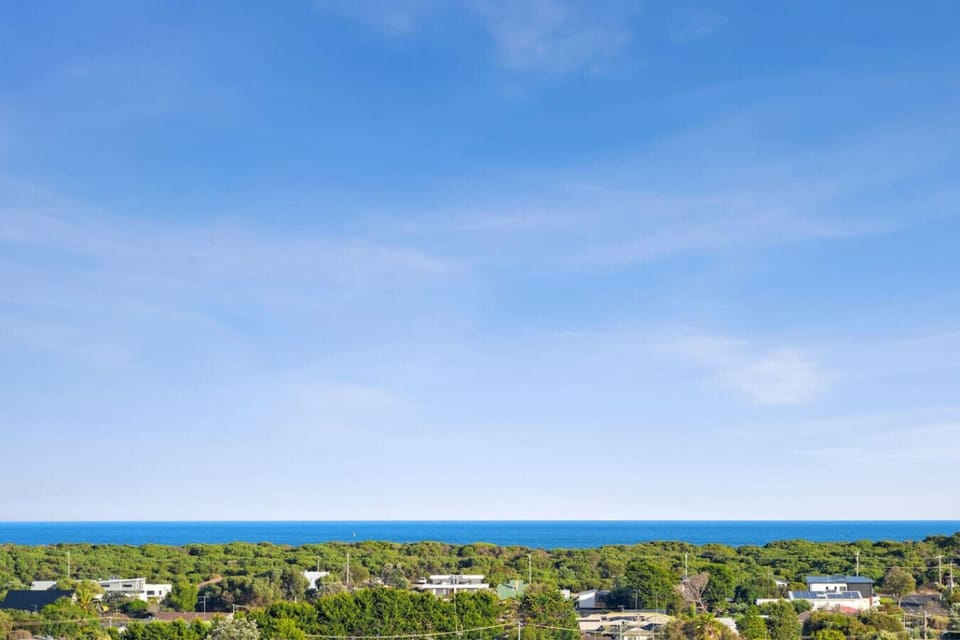 Stunning ocean view stretching beyond peaceful neighborhood