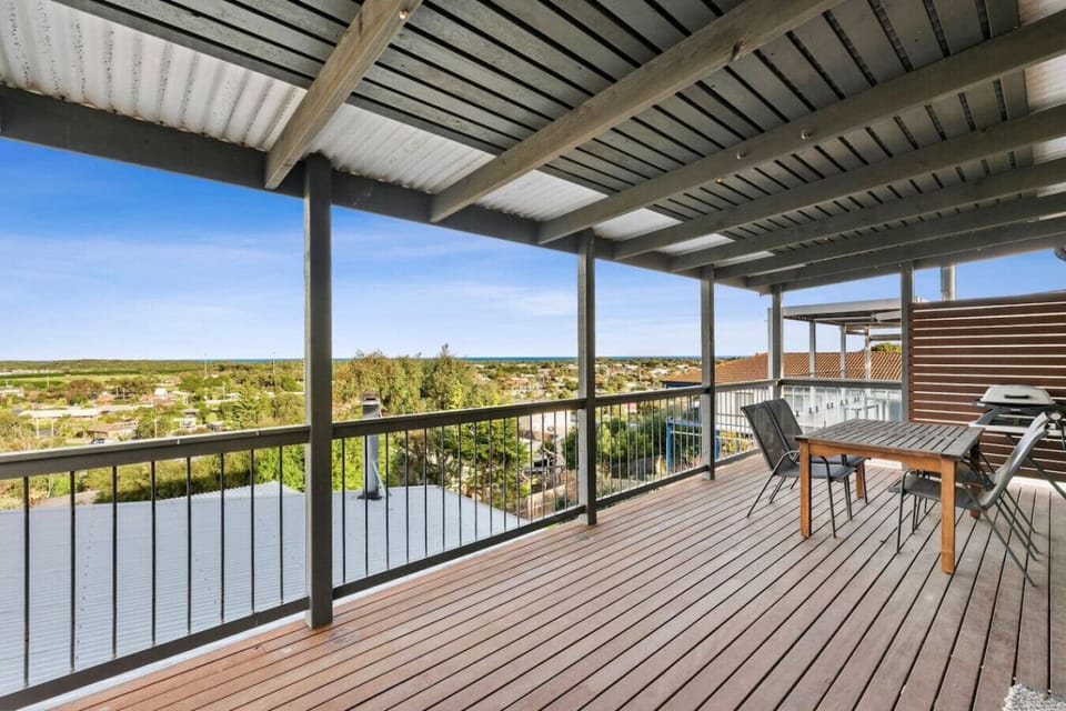 Breezy balcony with lovely views and outdoor seating