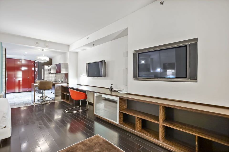 Living Area with 2 Flat Screen TVs