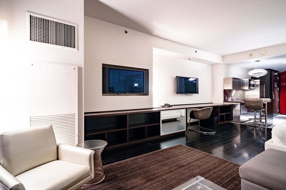 Living Area with 2 Flat Screen TVs