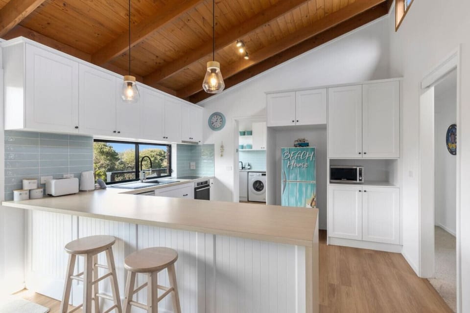 Breezy beach house kitchen with sweet coastal charm