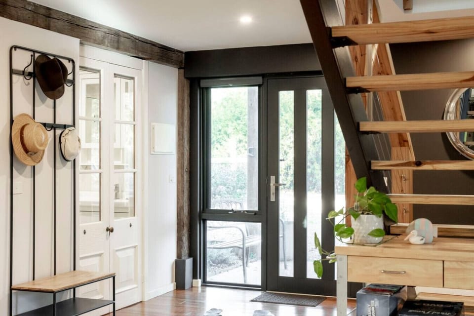 Welcoming entryway with rustic charm and natural light