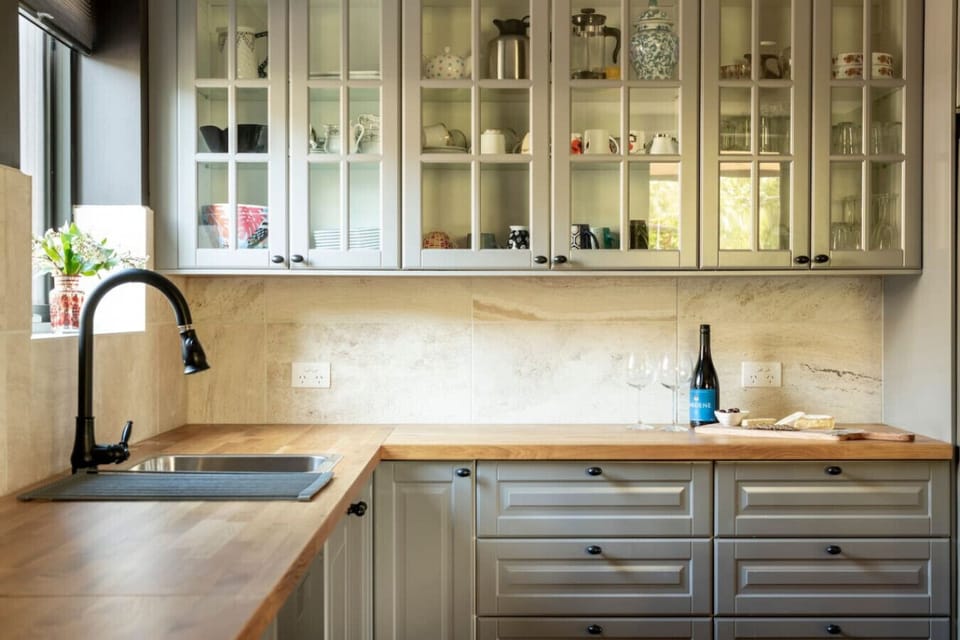 Lovely kitchen details with charming glass cabinet displays