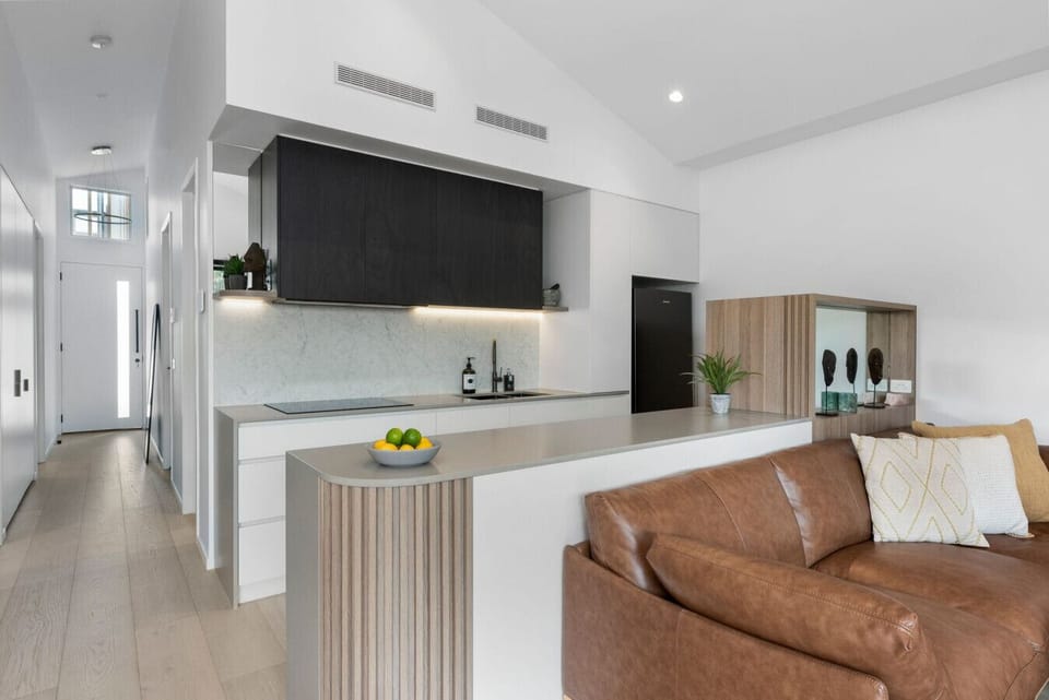 Sleek modern kitchen with a warm, welcoming feel