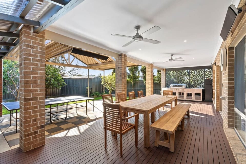 Alfresco dining, ping pong, BBQ & outdoor TV. The backyard won.