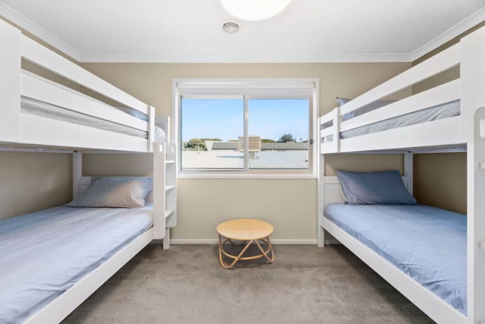 Bedroom 4: Double bunks x2. Four kids sorted, zero complaints.