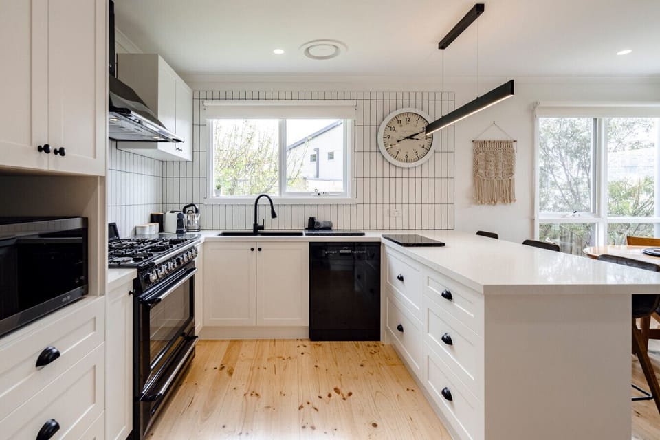 A proper kitchen. Gas range, dishwasher, black hardware & all the good stuff.