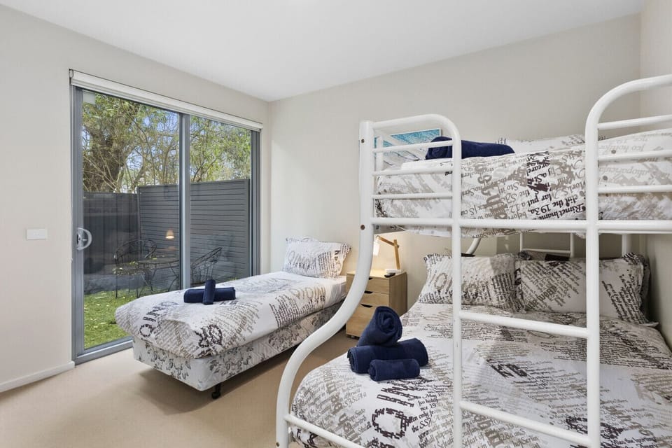 Bedroom 3: Versatile bedroom featuring a bunk bed and additional sleeping space, ideal for families or groups.