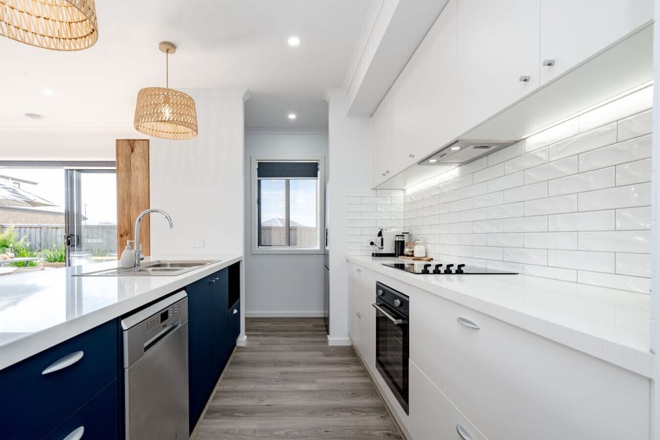 Bright, contemporary kitchen with sleek finishes and everything you need.