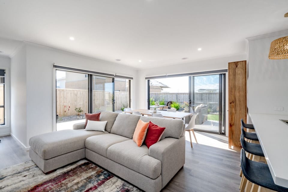 Spacious open-plan living area with seamless indoor-outdoor flow.