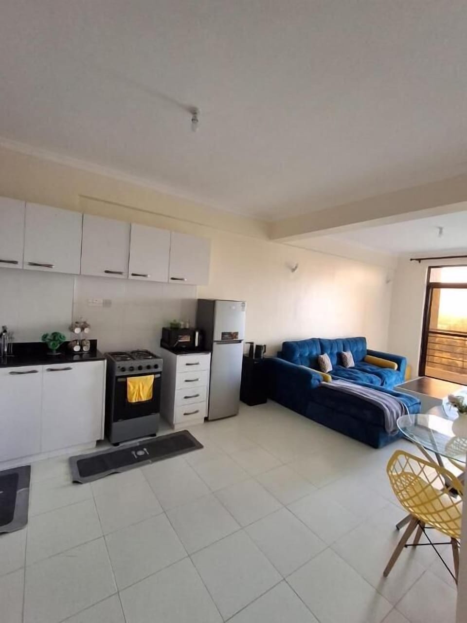 Deluxe Apartment | Living area | 32-inch Smart TV with digital channels