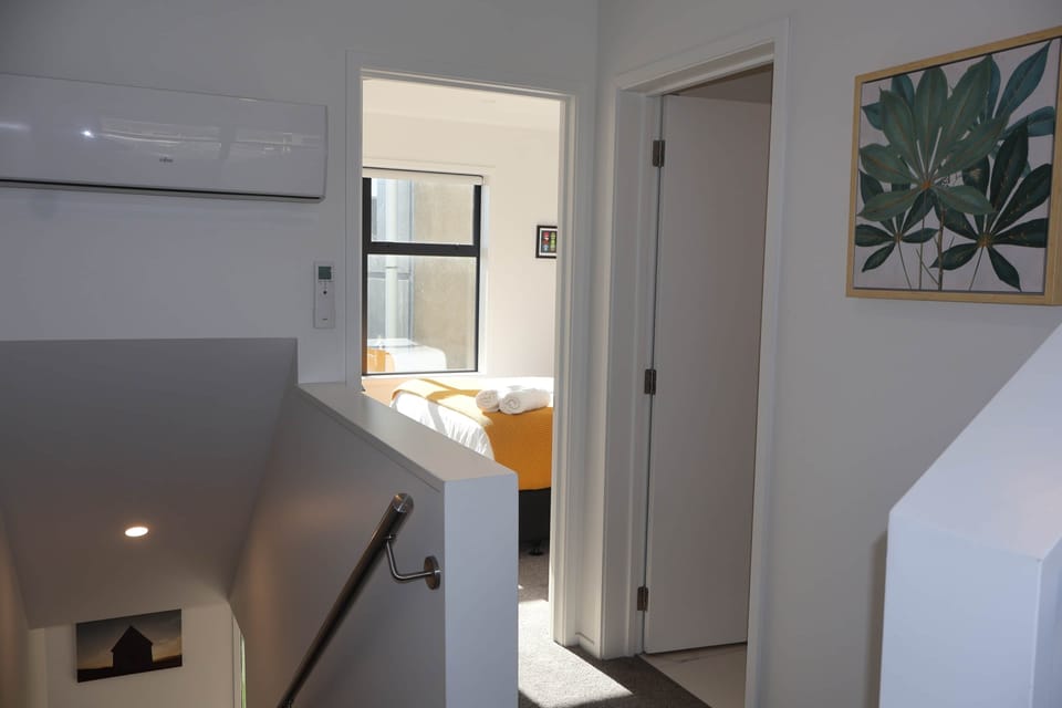 Sleep soundly in bedrooms set apart from the living areas, offering quiet and restful spaces for a c