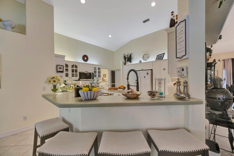 Kitchen island with bar seating and open layout
