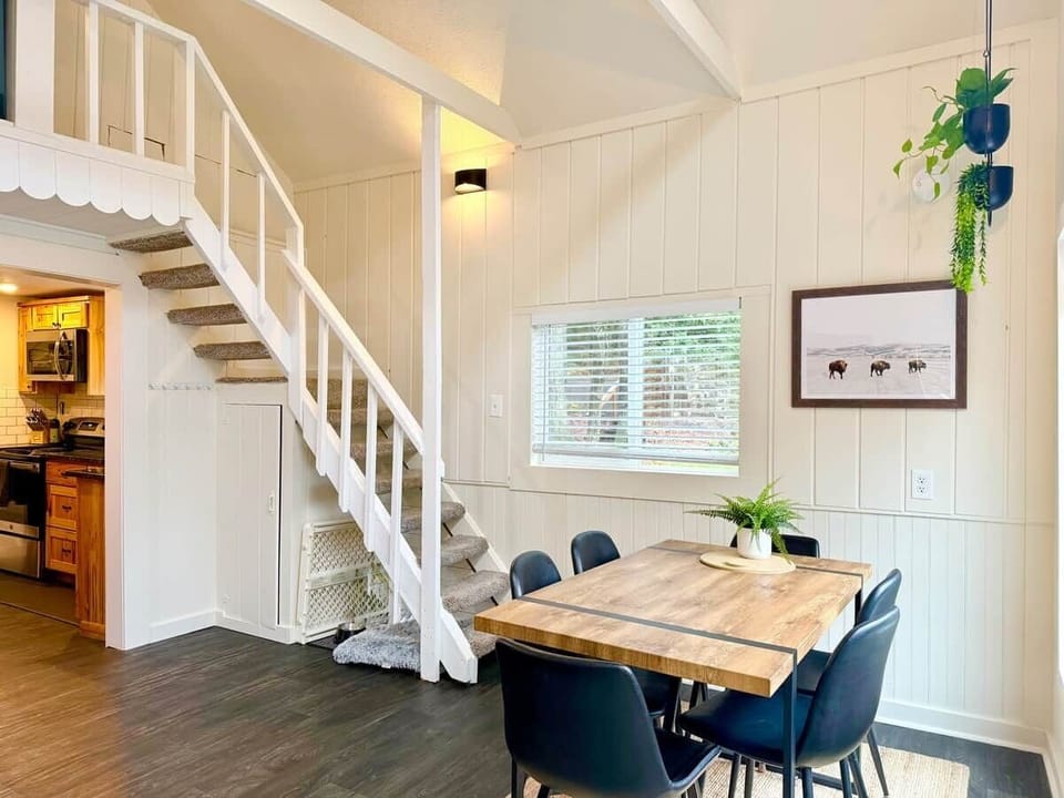 Dining table with six chairs. A portable high chair can also be found in the back closet.