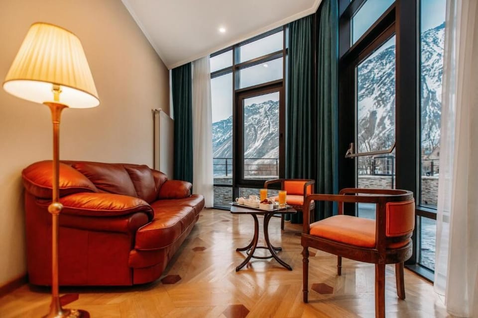 Junior Suite, Balcony, City View | Living area | TV