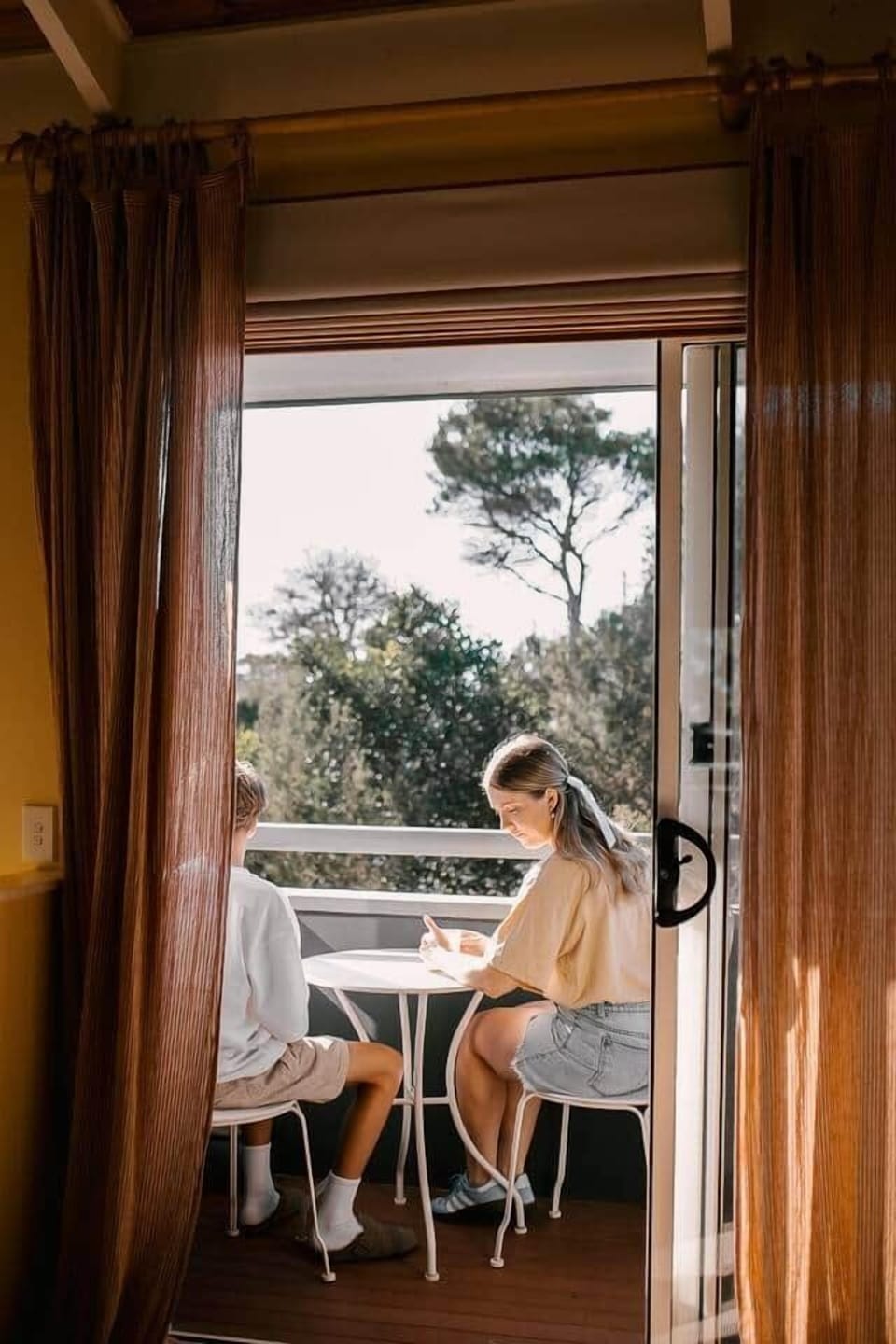 Our front balcony bathed in morning sunlight. The perfect spot for your morning coffee or tea. 

Captured by Elisa Herdman