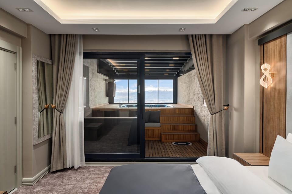 Villa, 3 Bedrooms, Sauna (Pool, Jetted Tub) | Minibar, in-room safe, iron/ironing board, cribs (free)