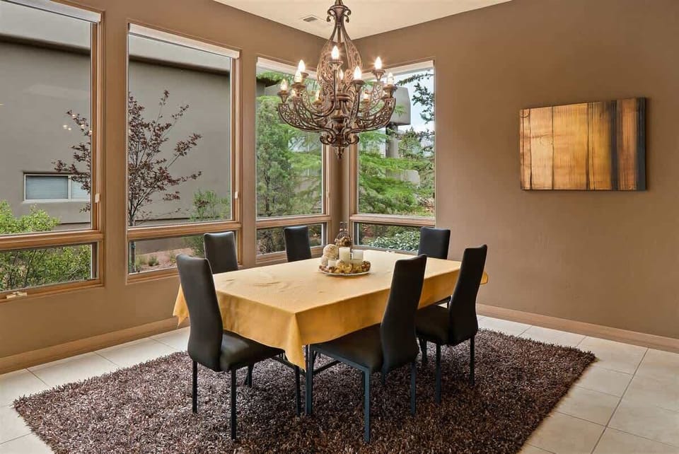 The dining table comfortably seats 6 guests