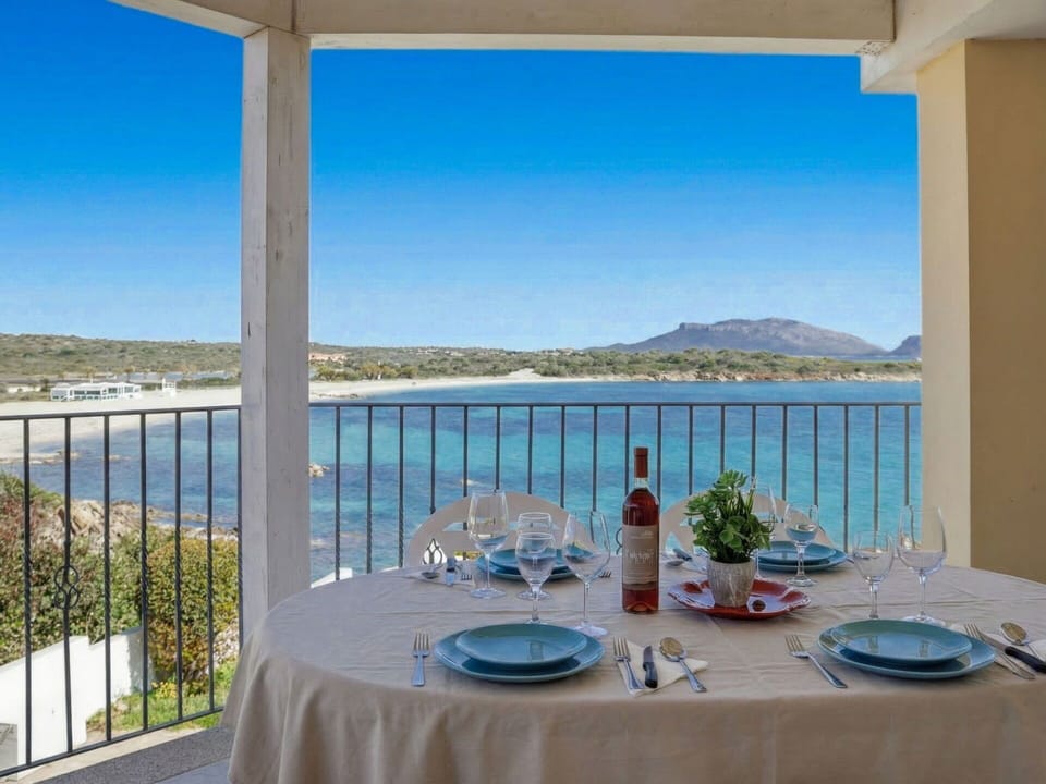 Coast, Sea, Coastal And Oceanic Landforms, Balcony, Ocean, Shore, Shade, Resort, Bay, Chair