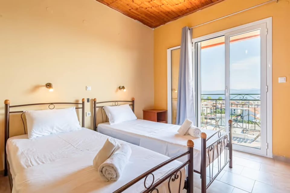 Wake up and step straight out to your balcony with sea views.