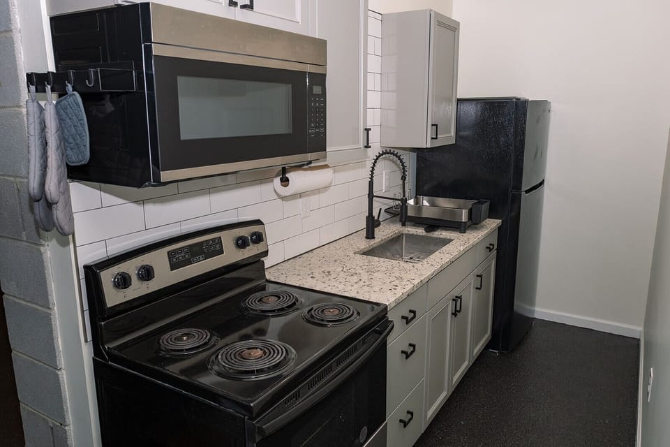 Guests have access to shared living space, fully equipped kitchen, washer/dryer and 1.5 baths at The Hub.