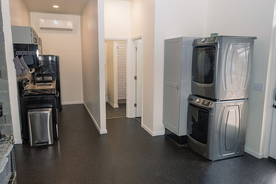 Guests have access to shared living space, fully equipped kitchen, washer/dryer and 1.5 baths at The Hub.