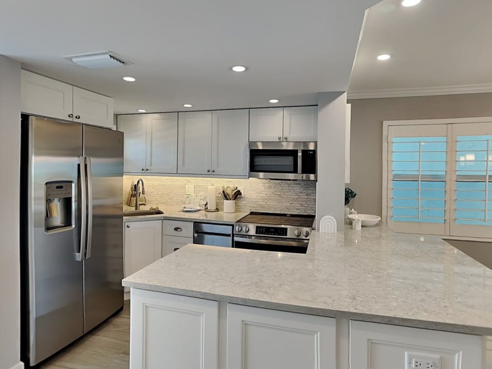 Fully Equipped Kitchen with Stainless Steel Appliances