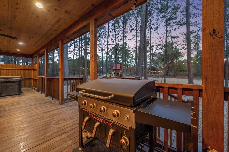 Fire up the Blackstone grill on your private deck and savor outdoor cooking surrounded by towering pines.