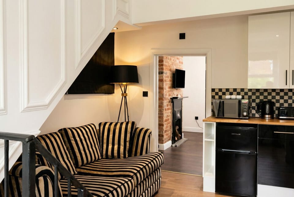 Every angle tells a story, from art deco lamp to exposed brick beyond.