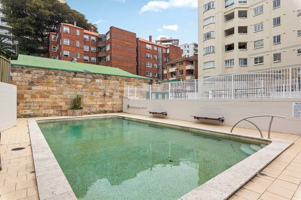 Enjoy access to a shared outdoor pool—perfect for cooling off or unwinding after a day by the harbour.