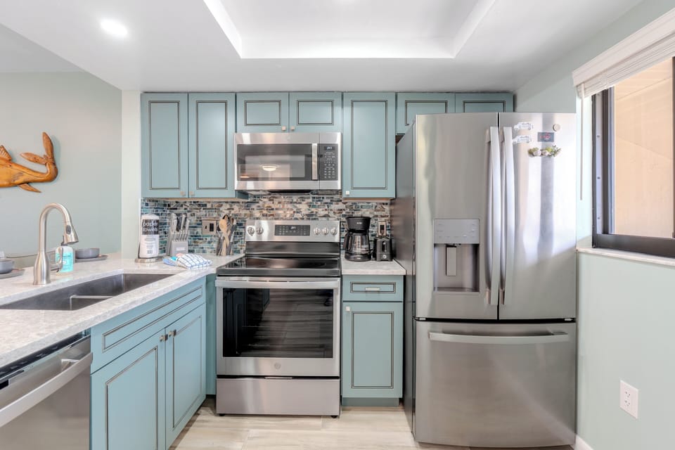 Cute kitchen with lots of extra storage.