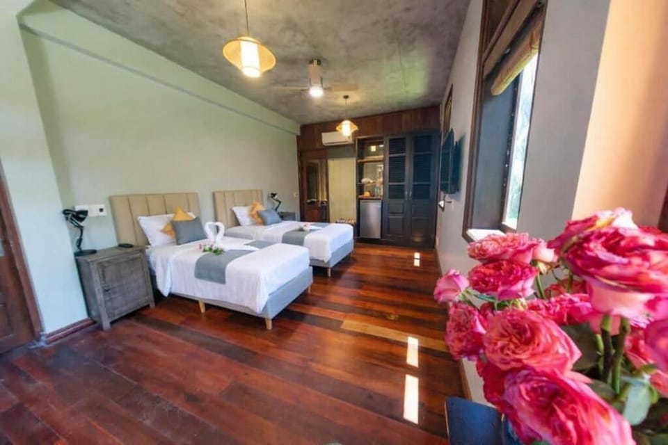 Deluxe Twin Room, Garden View | In-room safe, blackout drapes, iron/ironing board, free WiFi