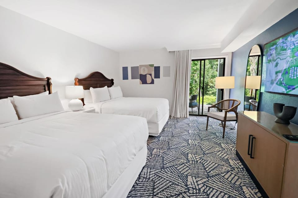 Stretch out on the sofa and savor leafy window views.