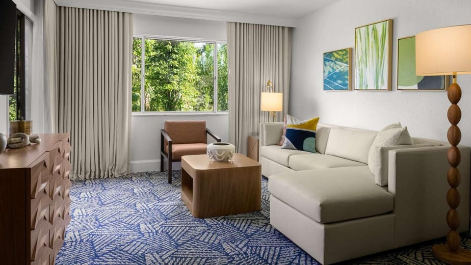 Relax by the sunlit window with calming leafy views.
