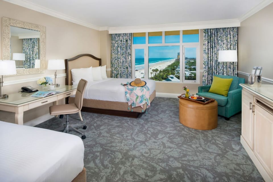 Unwind in bright double-queen comfort with sweeping shoreline views.