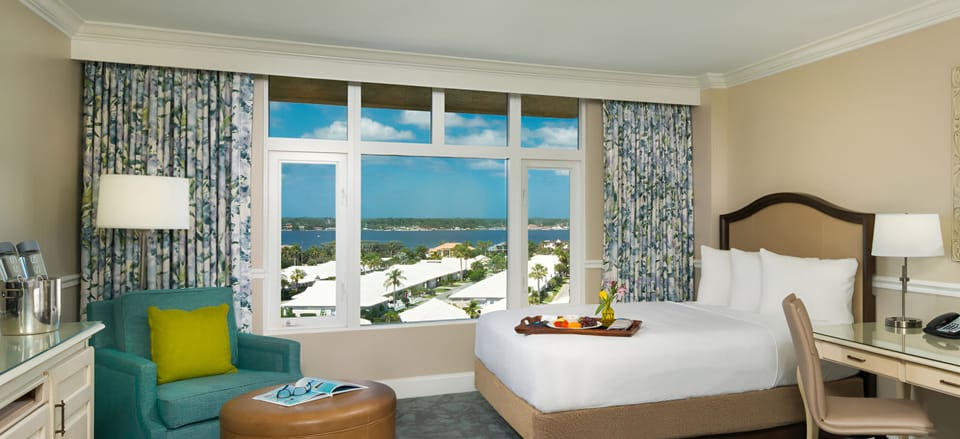 Relax in a serene bedroom with expansive bay outlooks.