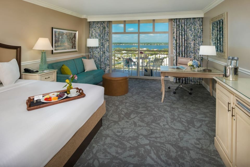 Plan the day at the desk with balcony views beyond.